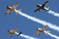  - T-28 flight overflying Airventure 2011. - by Bob Simmermon