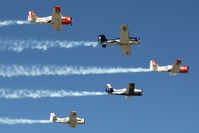  - T-28 flight overflying Airventure 2011. - by Bob Simmermon