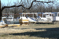  @ Fort Wolters Helicopters Heliport - Unknown F-16 fuselage in a scrap yard near Mineral Wells, TX - by Zane Adams