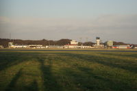  - Skyline of the apron of EHGG included the tower, terminal and a Transavia aircraft.  - by Jorrit de Bruin