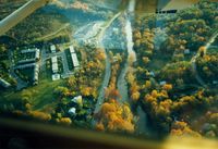  - Turning Right Base for Runway 24 over Red Oaks Mill at Dutchess County Airport, Poughkeepsie, NY - 1986  - by scotch-canadian