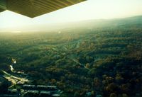  - Turning Right Base for Runway 24 over Red Oaks Mill at Dutchess County Airport, Poughkeepsie, NY - 1986  - by scotch-canadian