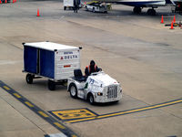  - Tug 73 at DCA - by Ronald Barker
