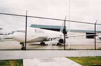 @ Hartsfield - Jackson Atlanta International Airport - Delta maintenance scanned from an old film shot.  Hurricane Frances was approaching the ATL - by Florida Metal