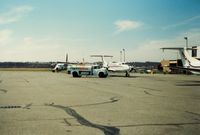  - Pilgrim Airlines Fokker F27's, Fuel Truck and Business Express Airlines Beech 1900's at Groton-New London Airport, New London, CT - circa 1980's - by scotch-canadian