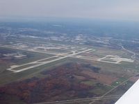  - View of Grand Rapids airport from the South East, runway 35 is at the lower left, runway 26L is on the right hand side. - by Dave Wells