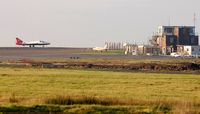  - A glimpse of winter sunshine on the airport.  - by Roger Winser