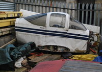  - Unidentified PA-38 Tomahawk section in the compound at Fairoaks. The wings behind are from Cirrus SR22 G-TAAA which crashed at Denham. - by moxy