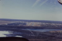  - One mile final to rwy 29R. Taken from N84891. - by GatewayN727