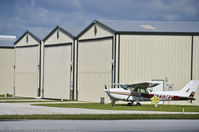  - Hangars and tied-down aircraft at X04 - by ApopkaHangars.com