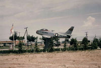  @ Zaragoza Airport - F-86 in front of the 406 TFTW Headquartes Bldg, Zaragoza AB, Spain.  Note the US Flag and Bicentenial Flag.  I was stationed in Spain for a total of seven years and on the 4th of July 1976 is the only time that I saw the flag flown in Spain. - by Ronald Barker
