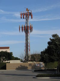  - OXR's Airport Rotating Beacon (clear-green) with sector block to the OXR Air Traffic Control Tower, atop one of several antenna farms. Location: SE. White-red vertical antennas are cell phone repeaters. - by Doug Robertson