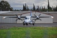  - Mitsubishi MU-2 Holding Short for departure El Monte - by Rich Spellman