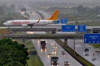  - Taxi from rwy 26R in beautiful summer rain...... - by Holger Zengler