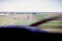  - On final for 34, University Airport, EDU, formerly 0o5, 1975. - by Reed Maxson