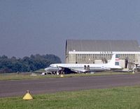  - Poor quality photo as scanned & processed from old dia. Loftleidir's DC- 6B, ex PAN AM clipper parked near hangar. Registration is probably TF-LLB. 1962 is a close guess   - by Jean M Braun