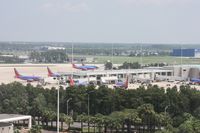  - Southwest using all the gates in Airside 2 due to cancelled flights in the Northeast from Hurricane Irene - this was after Jet Blue moved to Airside 1 and before Air Tran moved to Airside 2 - by Florida Metal