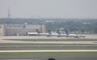  - 4 Continental/United planes sitting at their hangar parked due to cancellations from Hurricane Irene - by Florida Metal