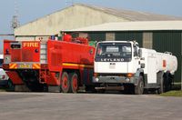  - Scammel Fire and Rescue tender FIRE 1 and recently arrived Leyland Jet A-1 fuel tanker. - by Roger Winser