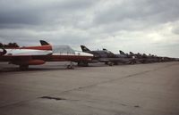  @ EGVI - Line up of 2 seat Hawker Hunters at IAT 76 held at RAF Greenham Common in July 1976. Celebrating the 25 years since the first flight of the Hunter on 20 July 1951.  - by Roger Winser