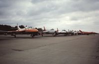 @ EGVI - Line up of Hawker Hunters (including the prototype)
at IAT 76 held at RAF Greenham Common in July 1976. Celebrating 25 years since the first flight of the prototype on 20 July 1951. - by Roger Winser