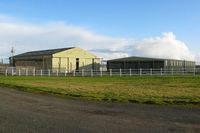  - T2 hybrid type? (Hangar 1) and Bellman (Hangar 2) hangars at Swansea Airport. - by Roger Winser