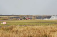  - Airport Fire and Rescue Services FIRE 1 and FIRE 2 tackle a blaze on the perimiter of the airfield. - by Roger Winser