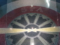  - Logo in floor inside main entrance. - by John S. Anderson