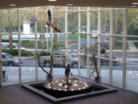  - Arrivals and departures from inside the main terminal. - by John S. Anderson