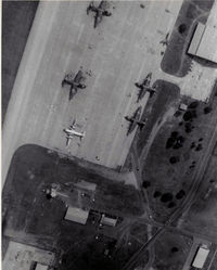  @ Khorat Air Force Base Airport - Overhead pattern summer 1972.  Note the F-105 that is in two pieces in the upper right corner. - by Ronald Barker