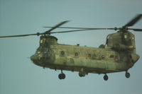  - The second of three chinook choppers.  This one has a number (124) on the upper rear of the aircraft.  This is all I can see for any sort of identifying number.  Again, any assistance in identifying these aircraft would be appreciated. - by Daniel Ihde