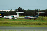  - A couple of unexpected tails in Australia: F100s of Germania (Germany) and US Airways (USA) - used for parts by Alliance - by Micha Lueck