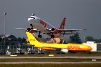  - One of those rather rare take-offs of civil aviation on rwy 08R..... - by Holger Zengler