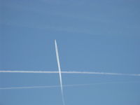  - Jet contrails past SZP Rwy 04-22; upper is in unusual heading - by Doug Robertson
