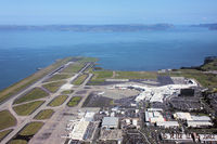  - Threshold RW05 from 1400ft in the overhead, Manukau Harbour and Awhitu Peninsular in the background. - by Peter Lewis