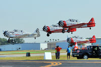  @ Lakeland Linder Regional Airport - Aeroshell Display Team at 2012 Sun N Fun - by Terry Fletcher