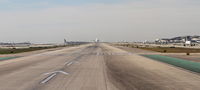  - On the left, a Lufthansa 744 is arriving from Frankfurt. in the center is a Delta A319 departing RWY 25R to Salt Lake City, and to the right on TWY B is a United A319 bound for Los Cabos. - by Mark Kalfas