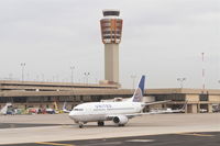  - Phoenix Sky Harbor - United Airlines Boeing 737-524 operating as flight #1620, on TWY D after arriving from Houston's Bush Intercontinental Airport/KIAH. - by Mark Kalfas