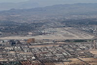  - McCarran International/LAS, west of the airport, climbing through 6,000' heading 020 on the STAAV4 departure. - by Mark Kalfas