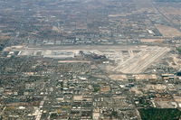  - McCarran International/LAS, north of the airport, climbing through 12,000' heading 090 on the STAAV4 departure.
 - by Mark Kalfas