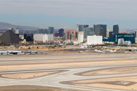  - Las Vegas, McCarran International looking at the west/northwest side of the airport with the Strip in the background as seen on departure from RWY 25R. - by Mark Kalfas