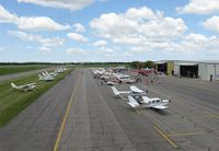  - View of the ramp during the latter hours of the 2012 fly-in lunch. - by Kreg Anderson