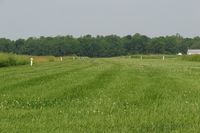  - Looking west down the grass runway - by Kevin Kuhn