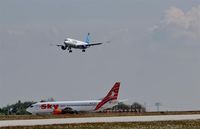  - Incoming and outgoing traffic on rwy 26R.... - by Holger Zengler