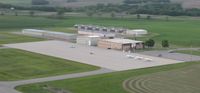  - A view of the ramp at Fergus Falls Municipal Airport after departing runway 13 on a Sunday evening. - by Kreg Anderson