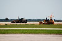  - Volvo Road Grader and Komatsu D 41P Track Dozer work on Runway 18/36 at Sebring Regional Airport, Sebring, FL  - by scotch-canadian