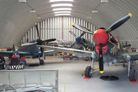 - from left to right, Supermarine Spitfire PR Mk XI PL965 (G-MKXI), North American P-51D Mustang 44-72035 (G-SIJJ) and Curtiss P-40 Kittyhawk 43-5802 (G-KITT) of the Hangar 11 collection - by Chris Hall