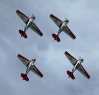  - The Aeroshell Aerobatic Team doing what they do best at the 2012 Ray Fagen Memorial Airshow. - by Kreg Anderson