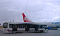  - A THY bus taking passengers to their plane - by Murat Tanyel
