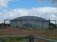  - one of the many surviving hangars at the former RAF Dumfries - by Chris Hall